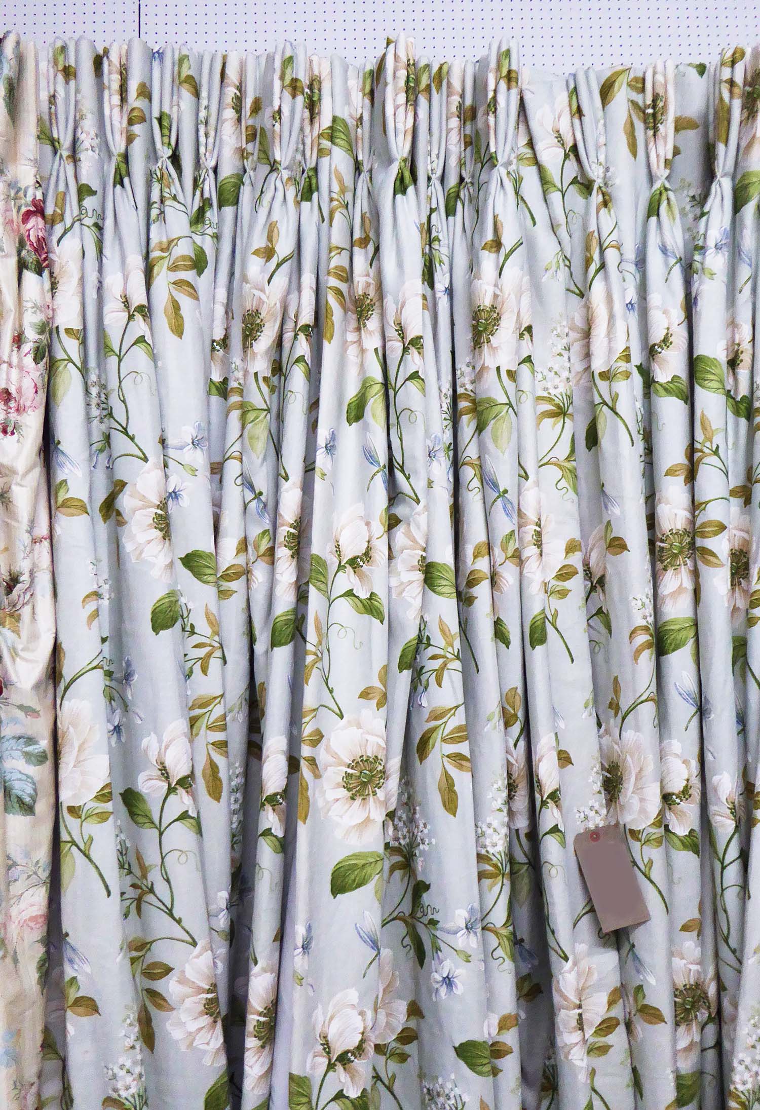 CURTAINS, two pairs, Colefax & Fowler 'Evesham' floral linen against a ...