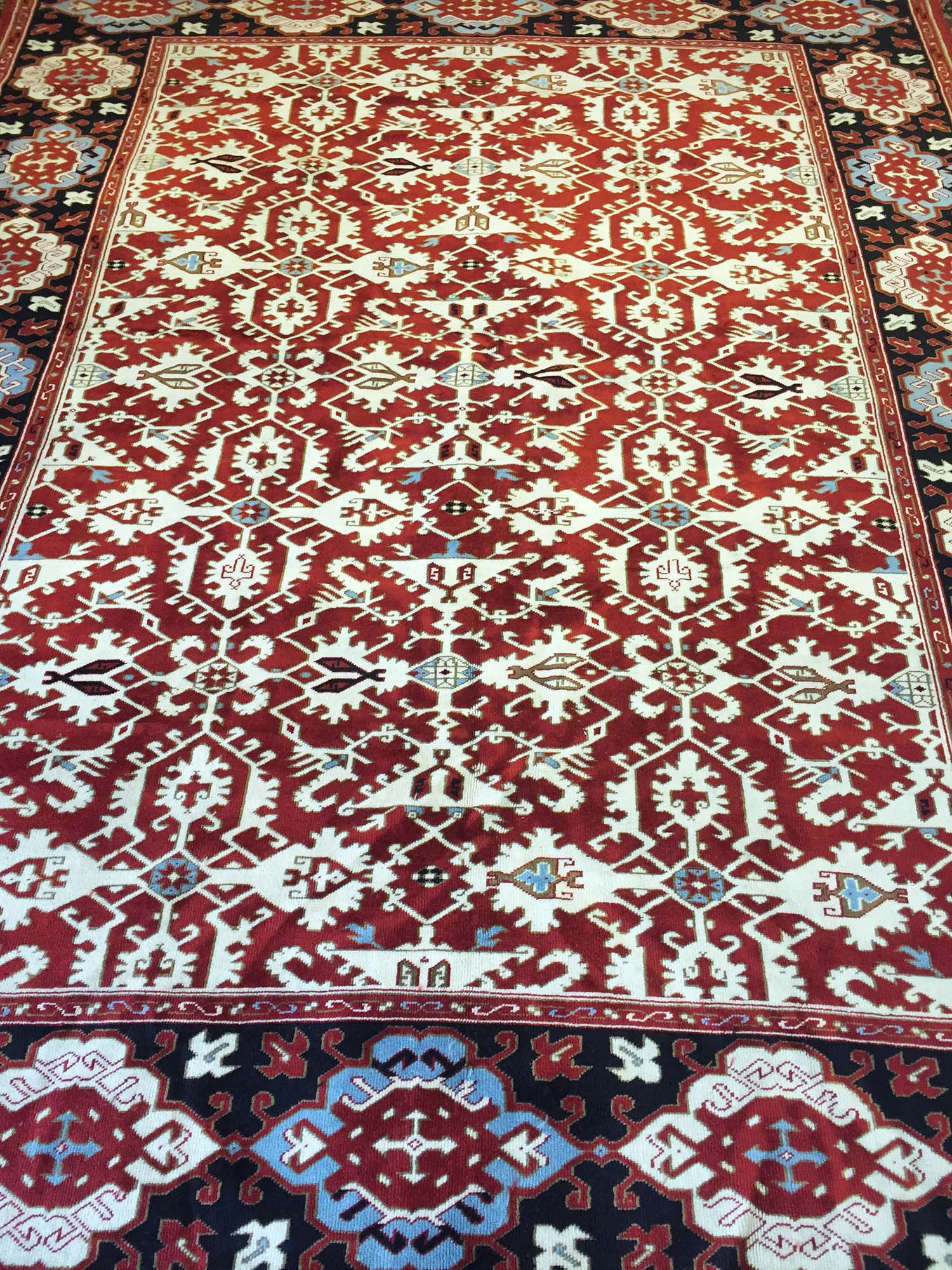 FINE TURKISH BELLINI DESIGN CARPET, 291cm x 209cm, all over design on a ...