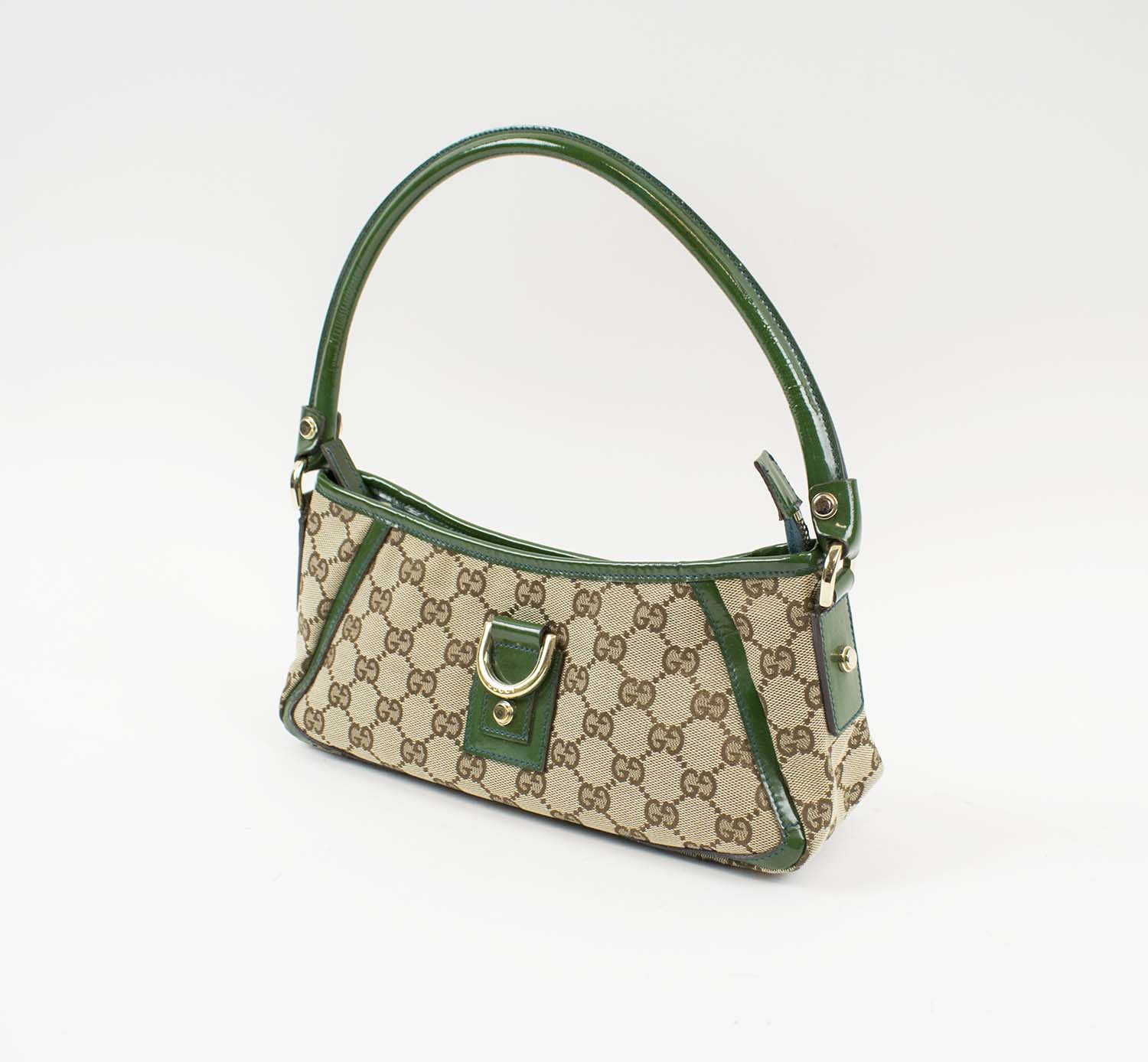 GUCCI ABBEY SHOULDER BAG, iconic monogram canvas with racing green patent  leather trim and handle, pale gold tone hardware, zip closure at the top  and D-ring detail at the front, with dust