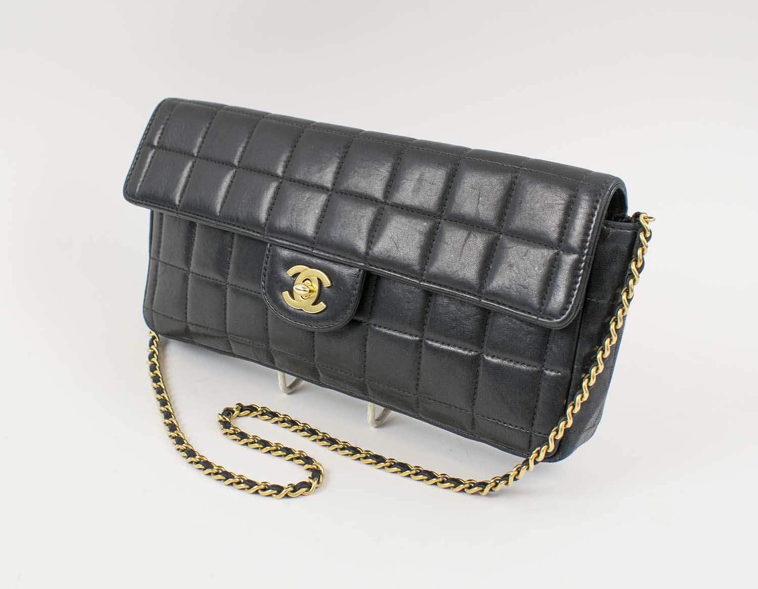 Lot - A Chanel vintage black calfskin square quilted East West