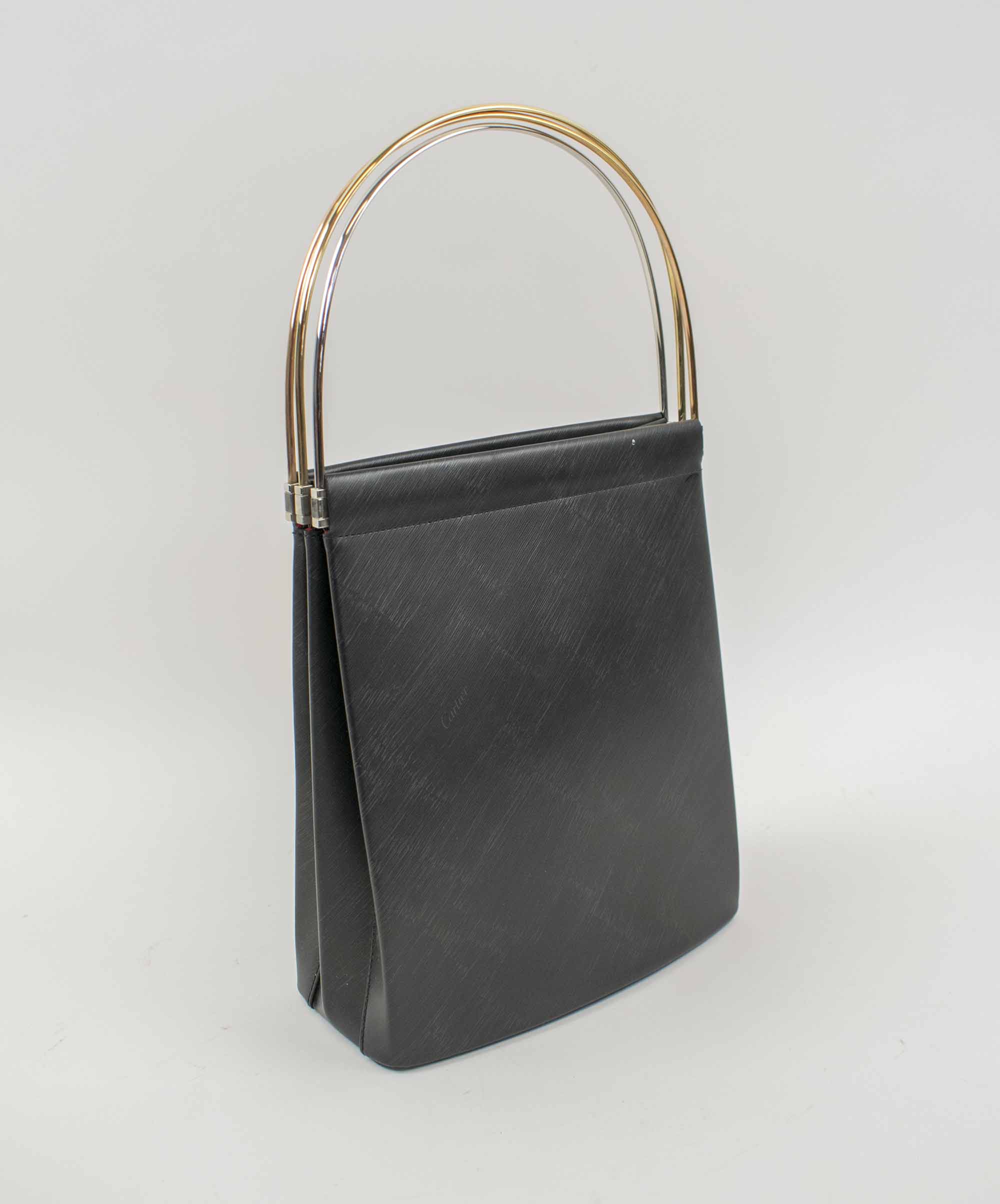 CARTIER VINTAGE TRINITY BAG, black leather with three iconic round top ...