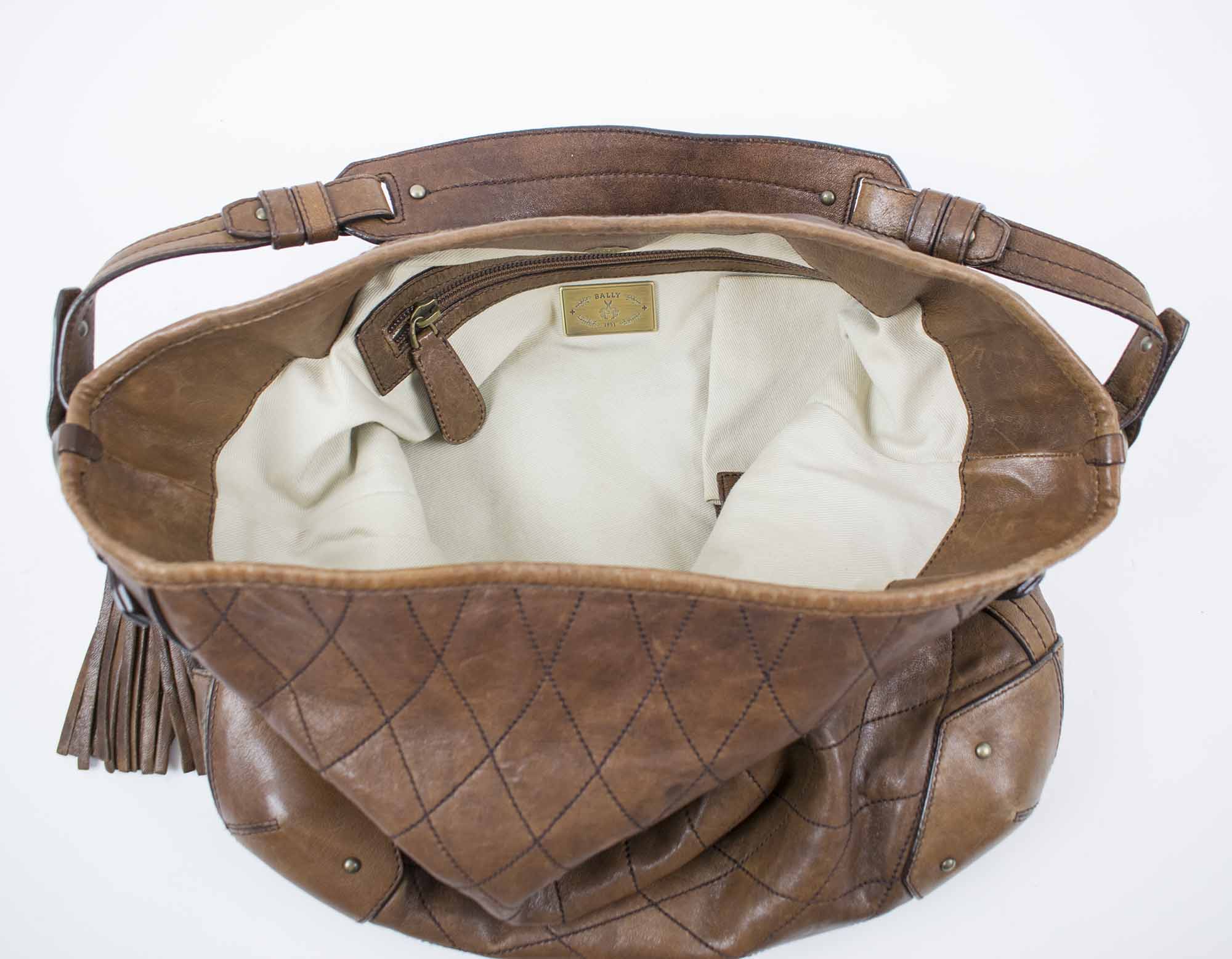 BALLY BROWN LEATHER TOTE BAG, quilted pattern with shoulder strap and  magnetic snap closure, cream fabric lining, 35cm x 36cm H.