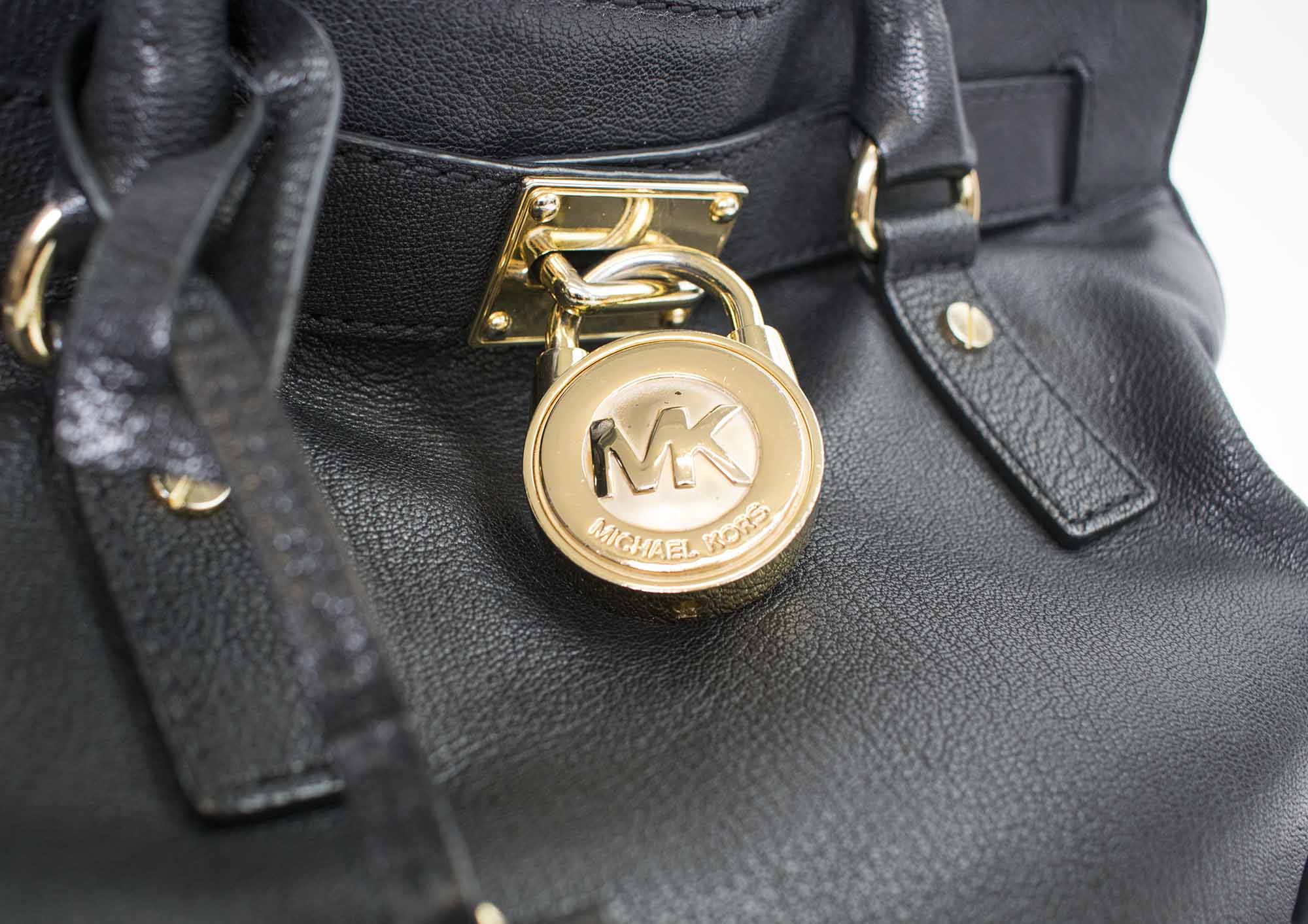 michael kors black satchel with gold chain