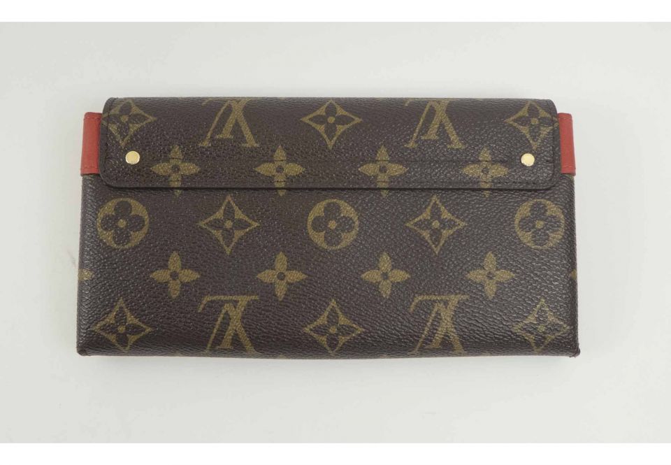 LOUIS VUITTON ELYSEE MONOGRAM WALLET, with gold tone clasp at the