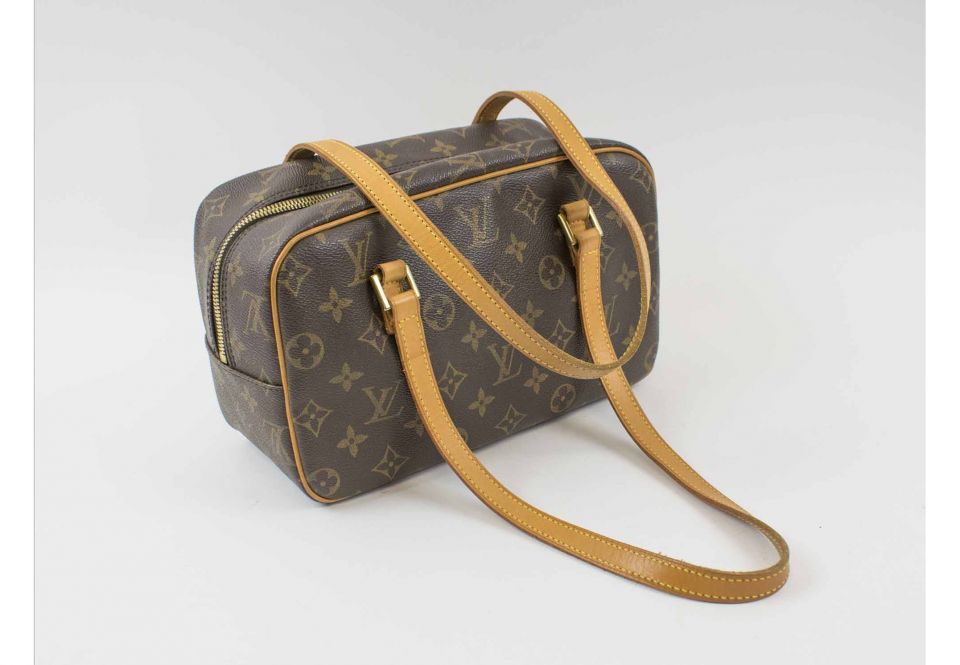 Sold at Auction: A LOUIS VUITTON MONOGRAM TOTE BAG WITH RED PATENT LEATHER  STRAP