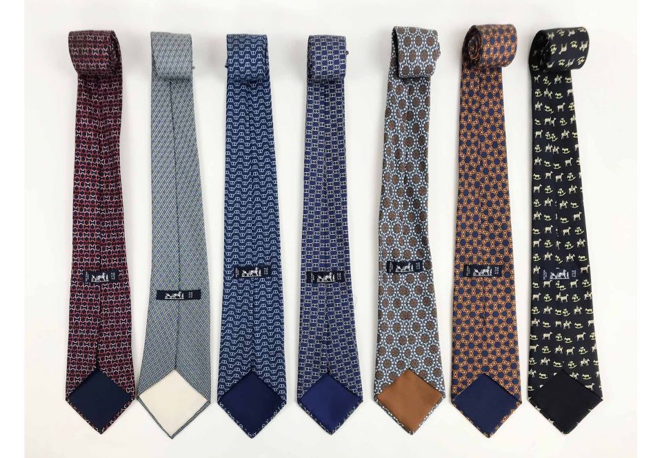 HERMÈS TIES, a collection of seven patterned silk ties. (7)