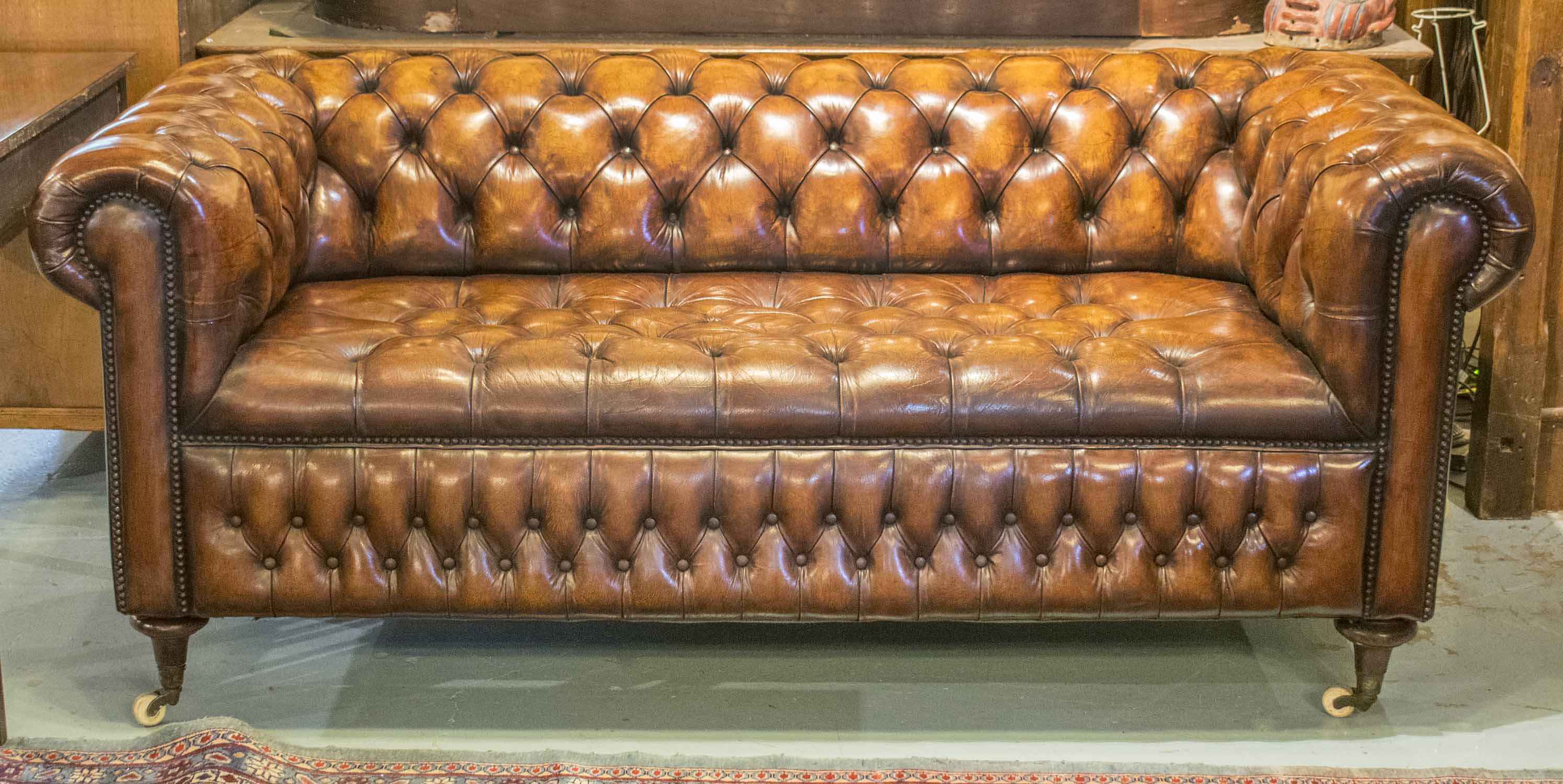 chesterfield style tufted leather sofa