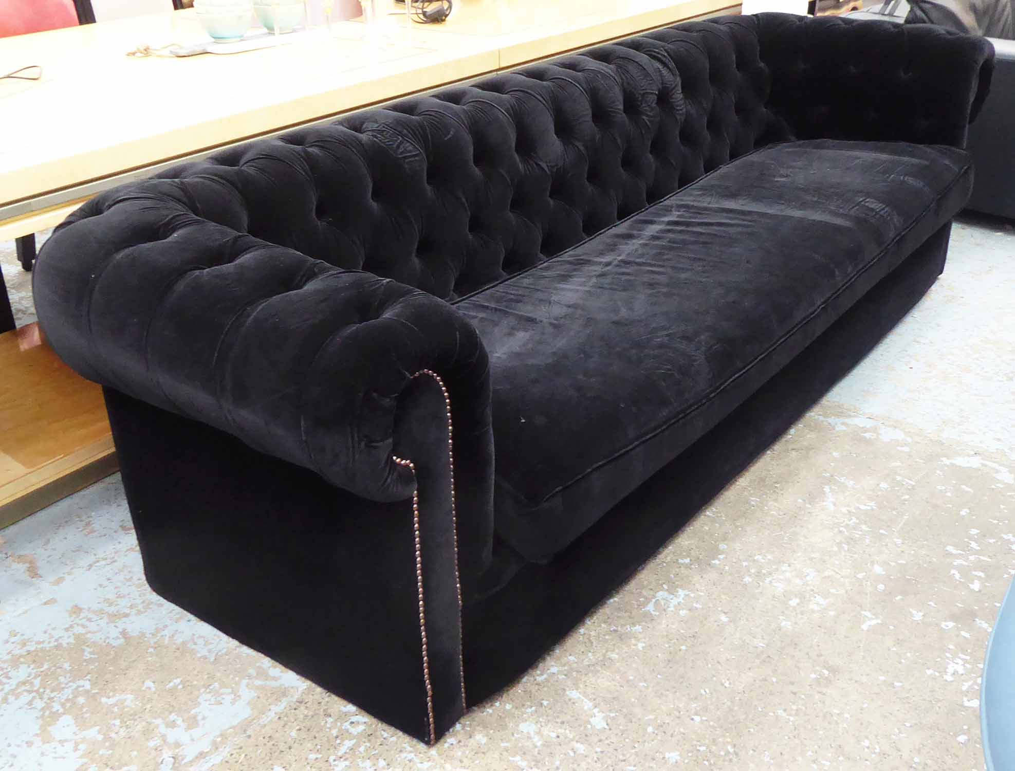 CHESTERFIELD STYLE SOFA, contemporary, black velvet finish, 250cm W.