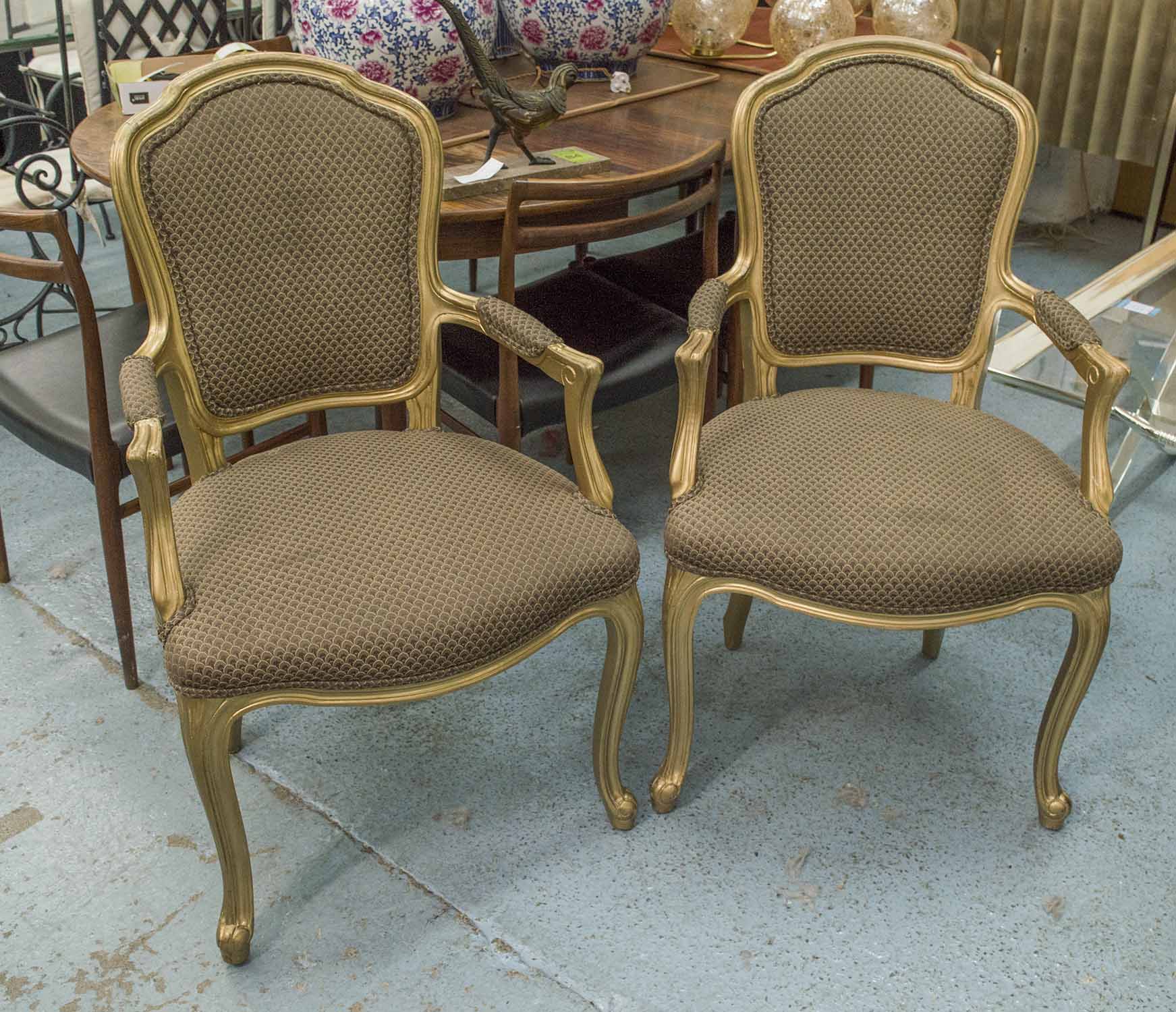 DINING ARMCHAIRS, a set of fifteen, French style gilt solid beech