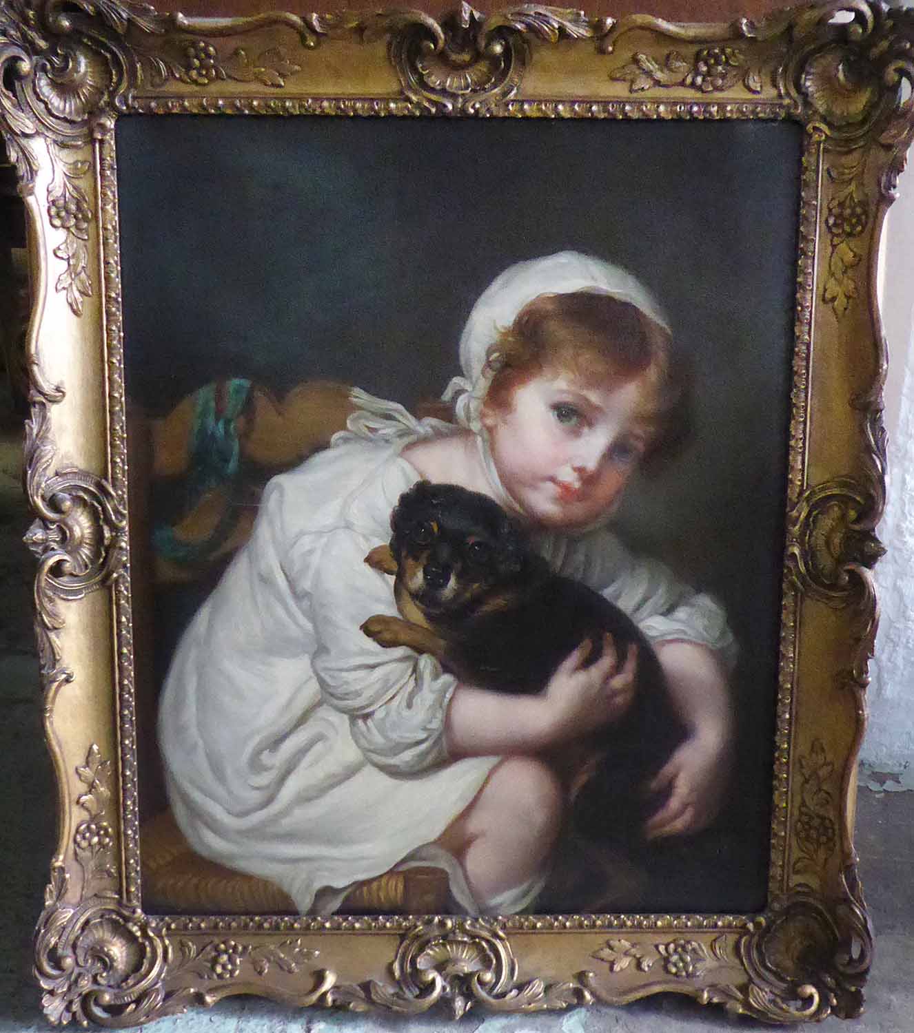 AFTER JEAN-BAPTISTE GREUZE 'Girl Holding her Dog', oil on canvas, 65cm ...