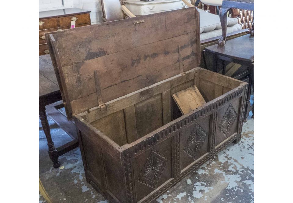 COFFER, Charles II oak with a rising lid and carved triple panel front ...